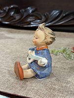 Left side profile of figurine
