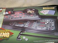Box showing full casino set contents and branding