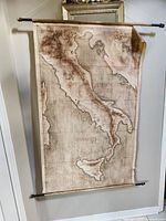 Front view of full cloth map hanging