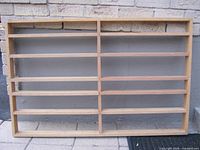 Front view showing full shelf and compartment layout