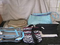 Overview of all bags and pouches laid on countertop