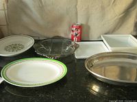 All six serving pieces displayed together on countertop