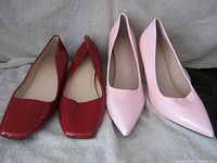 Front view of red flats and pink pumps