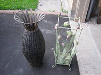 Wicker umbrella stand and metal tulip stand side by side