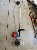 Full view of Echo GT-200R string trimmer with line spool on floor