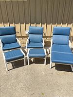 Set showing two chairs, two ottomans and chaise lounge