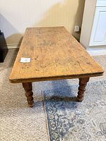 Full view of pine coffee table top and legs