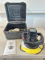 Waxer, storage case with cloths, manual overview