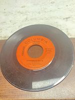 Side A label "Questions 67 and 68" showing Columbia branding and record wear
