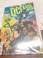 Front view of DCeased #1 variant comic in bag