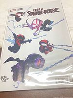 Front cover showing full artwork, bagged