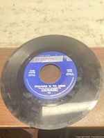 A-side label showing artist, title, Reprise logo and surface condition