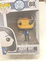 Front view of boxed Funko Pop Agent May #88