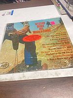 Front cover under shrinkwrap showing title and import sticker