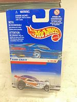 Front of sealed Hot Wheels Surf Crate blister card showing car and card graphics