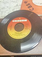 Label side showing Songs of Love on Columbia 45 RPM record