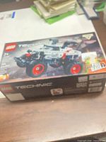 Front of LEGO Technic 42150 box showing main artwork and overall wear