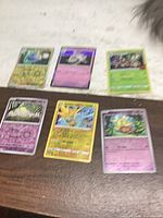 All six Pokémon cards laid out