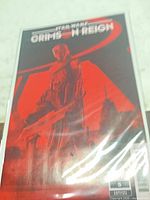 Full front cover of bagged comic showing artwork and overall condition
