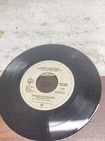 A-side label showing title, artist, Warner Bros. logo