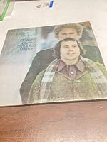 Front album cover featuring Simon & Garfunkel image