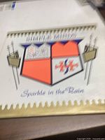 Front cover with album logo and title