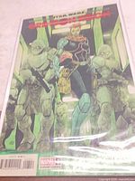 Front cover of bagged comic showing title and artwork