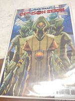 Front cover of bagged comic showing title, artwork and issue number