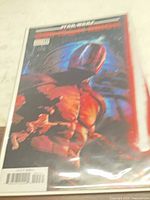 Front view of bagged comic showing full cover art