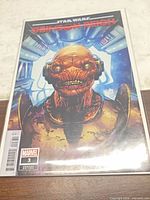 Front view of bagged comic displaying full cover art and issue details