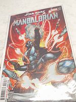 Front cover of the bagged comic showing full artwork and condition