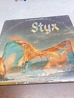 Front cover showing Styx Equinox artwork