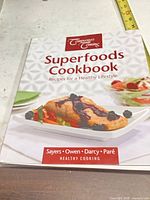 Front cover showing title, authors and food image