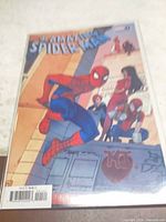 Front view of The Amazing Spider-Man #1 variant comic in bag and board