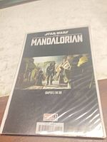 Front view of bagged Star Wars The Mandalorian #3 comic