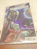 Front cover of The Mandalorian #3 variant comic in plastic sleeve