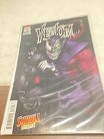 Front view of bagged Venom #8 Skrull Variant comic