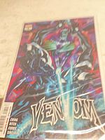 Front view of Venom #8 variant comic in protective bag