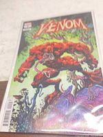 Front view of Venom #9 variant comic sealed in bag/board