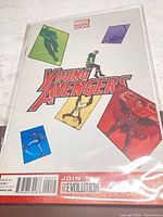 Front view of bagged Young Avengers #2 comic showing full cover art and Marvel NOW! logo