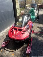 Front three-quarter view showing overall snowmobile condition