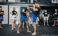 Group Muay Thai training session at VRTU gym
