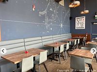 Restaurant interior seating with tables and chairs