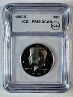 Front of ICG slab showing obverse of 1987-S Kennedy half dollar and label with grade PR69 DCAM