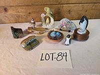 Group shot showing all eight bird-themed decorative items