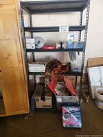 Entire shelving unit with all contents visible