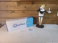Bidet box and statue front view