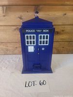 Front view of blue TARDIS pedal trash bin