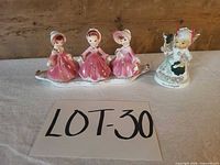 Group shot showing all four figurines