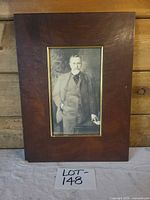 Full view of framed portrait print showing frame and image